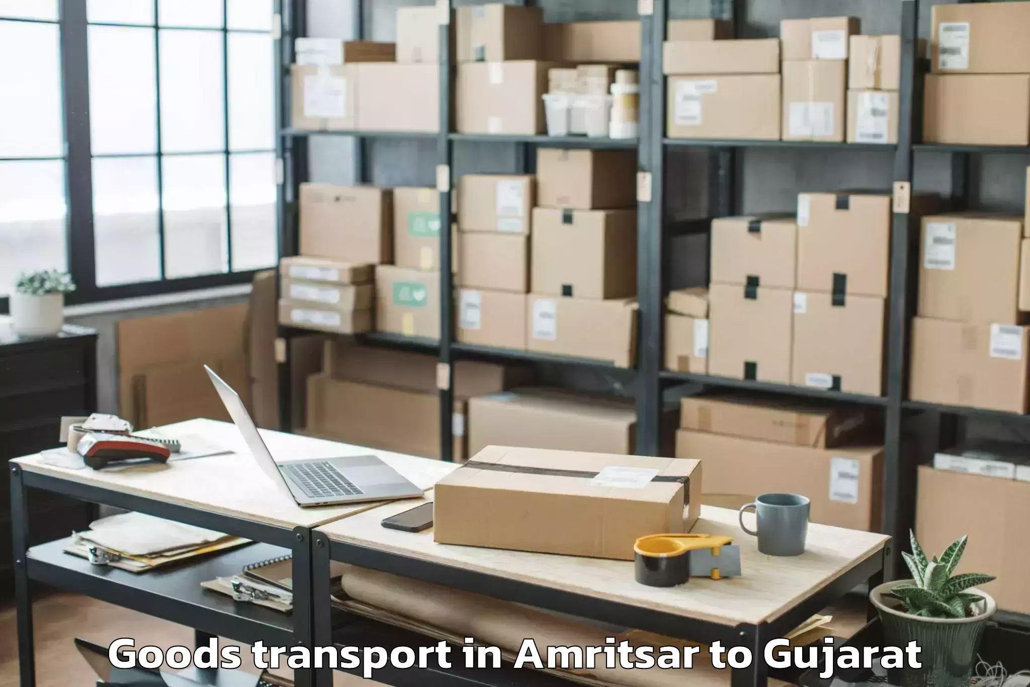 Easy Amritsar to Dhanera Goods Transport Booking